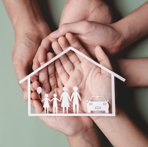Several hands hold paper cutouts of a family, a car, and a house outline, symbolizing protection and security for loved ones and belongings.